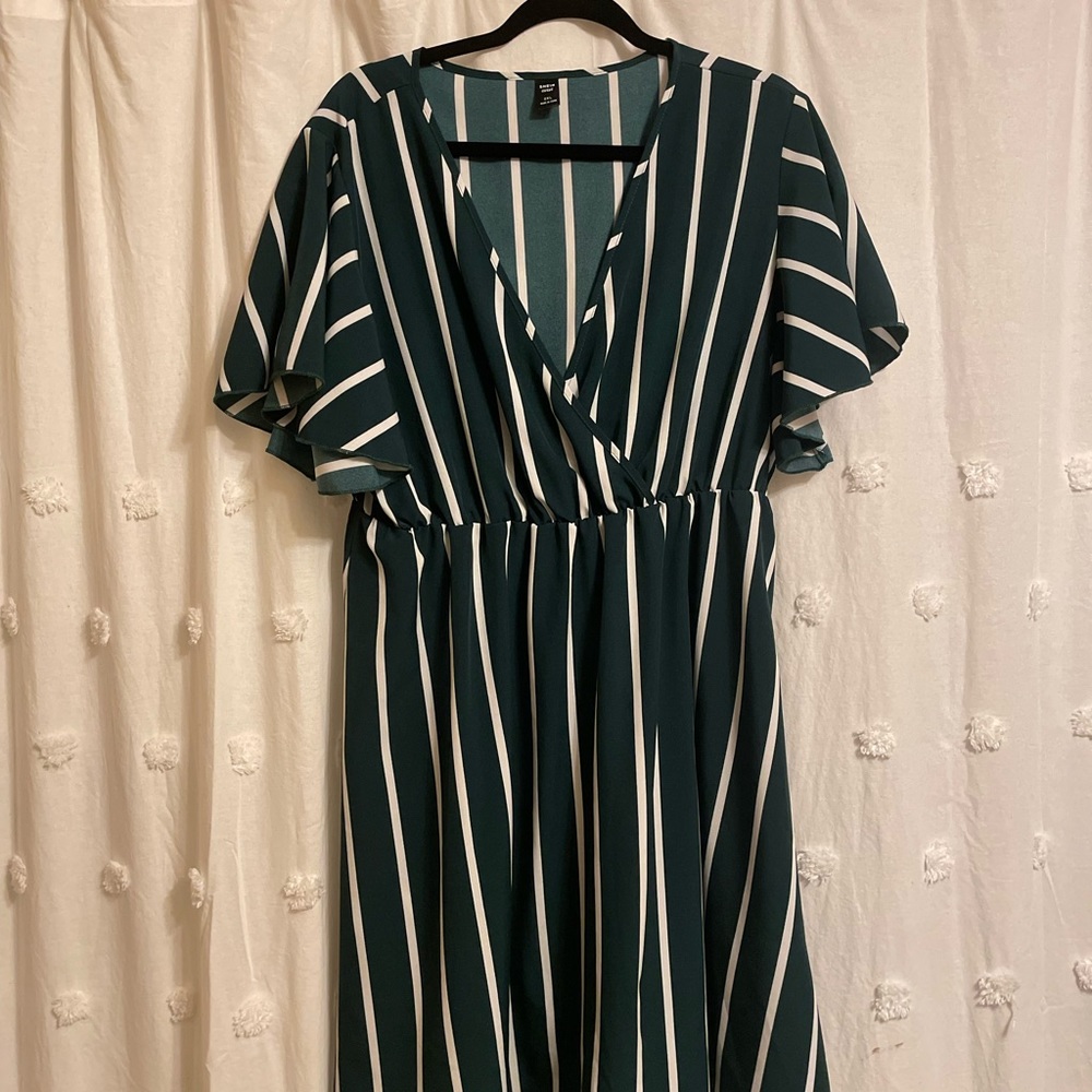 Green dress with white stripes